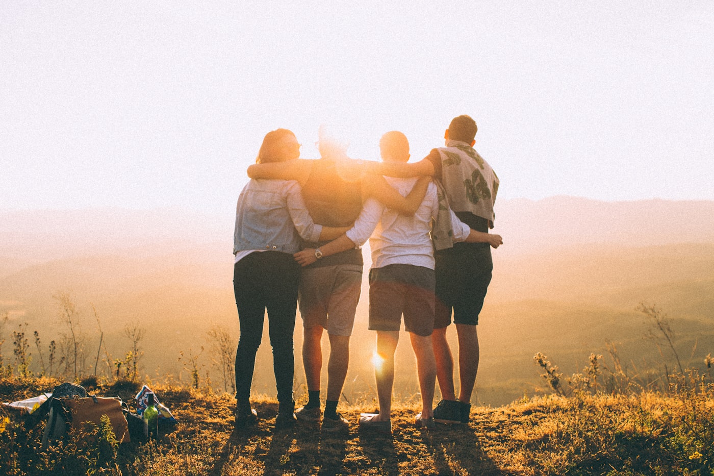 Friends together at golden hour, a sense of belonging